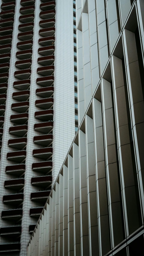 several mirrors in a very large building with a red top