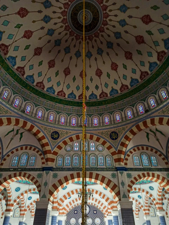 an image of a ceiling made out of multicolored designs