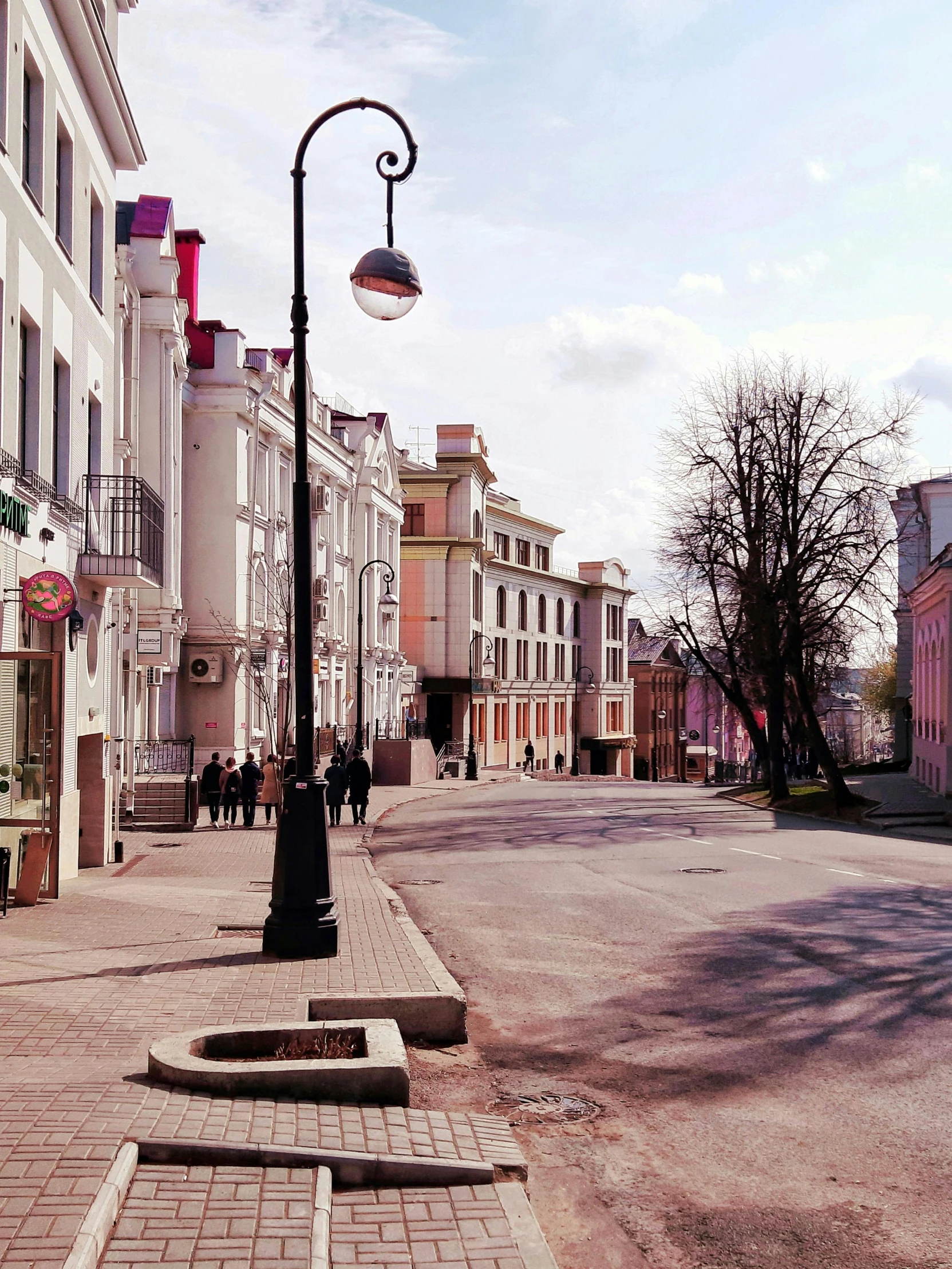 a road in front of some old buildings