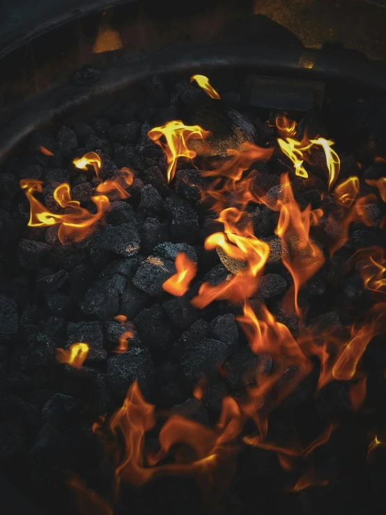 the fire is blazing up in a pan