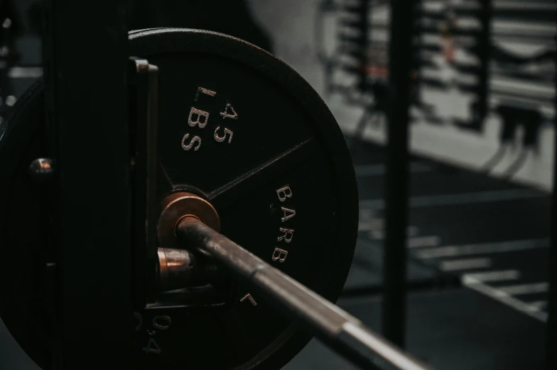 a man lifting the weight on a machine