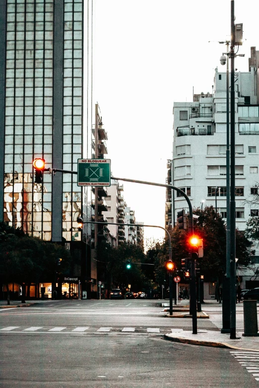 two traffic lights next to each other on the road