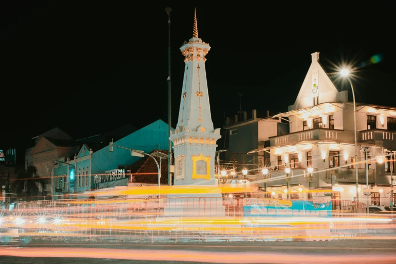 long - exposure po of the clock tower lit up at night