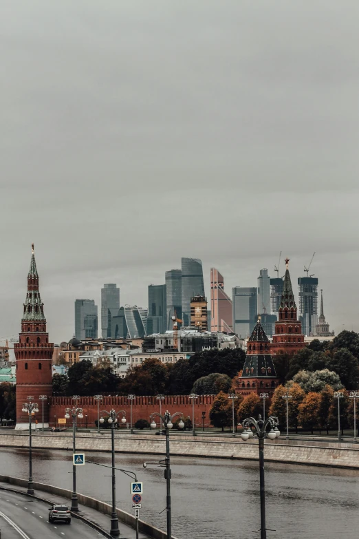 view of city from across the water on a cloudy day