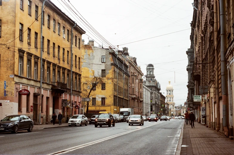 an image of some vehicles parked in the street