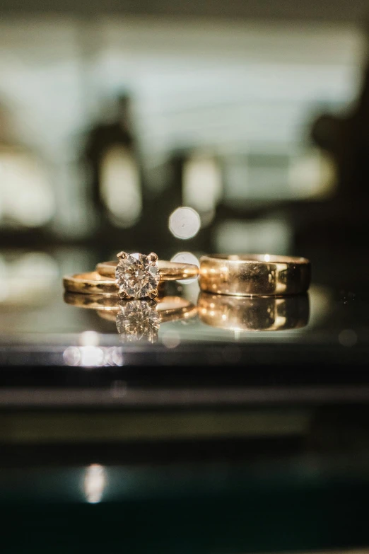 two different engagement rings on display in a jewelry shop