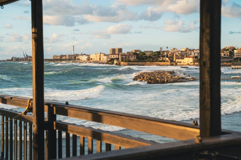 an ocean view from inside of a metal structure