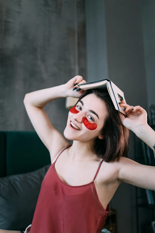 a woman is shown with the words red painted on her face