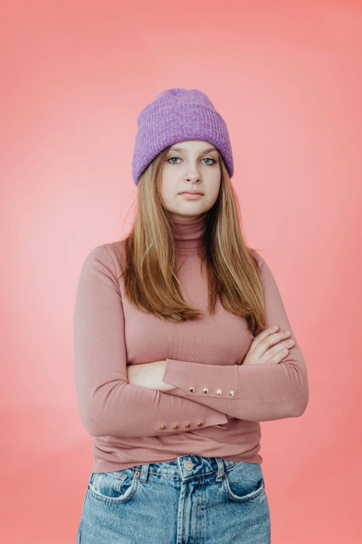 a woman in pink shirt with long hair