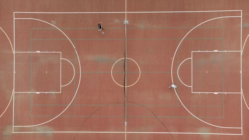 an overhead view of a tennis court with a line drawn out