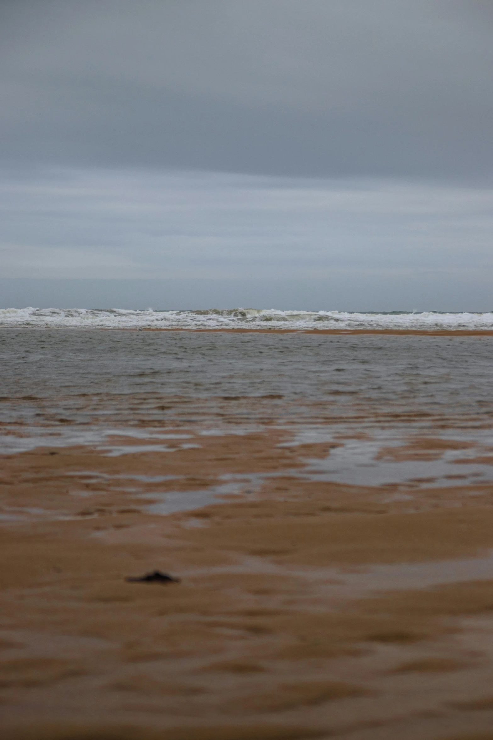 a lone white boat out in the distance