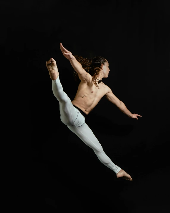 an image of a man doing dance on stage