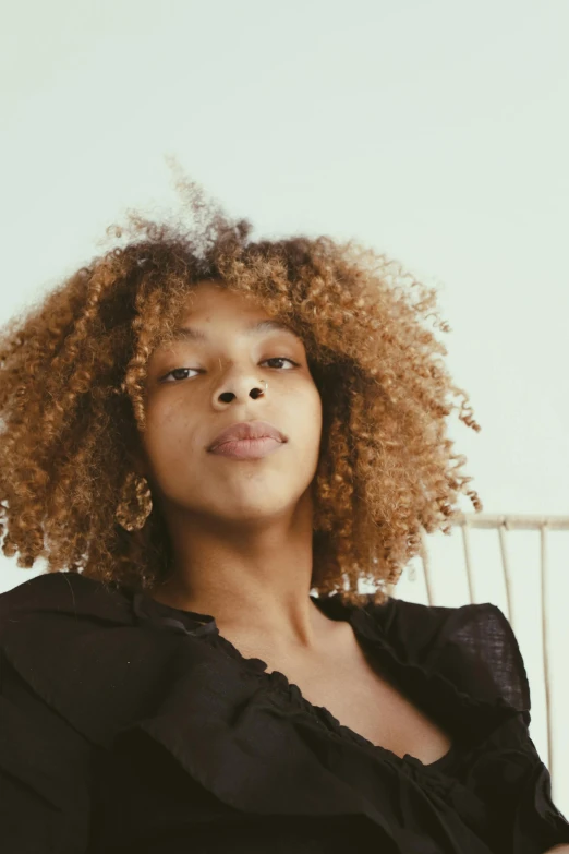 an image of a woman with natural hair