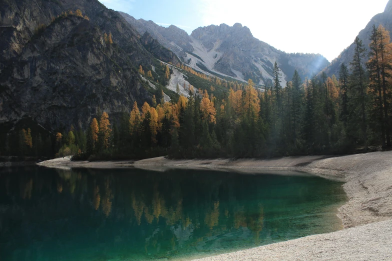 a lake in a mountainous area surrounded by mountains