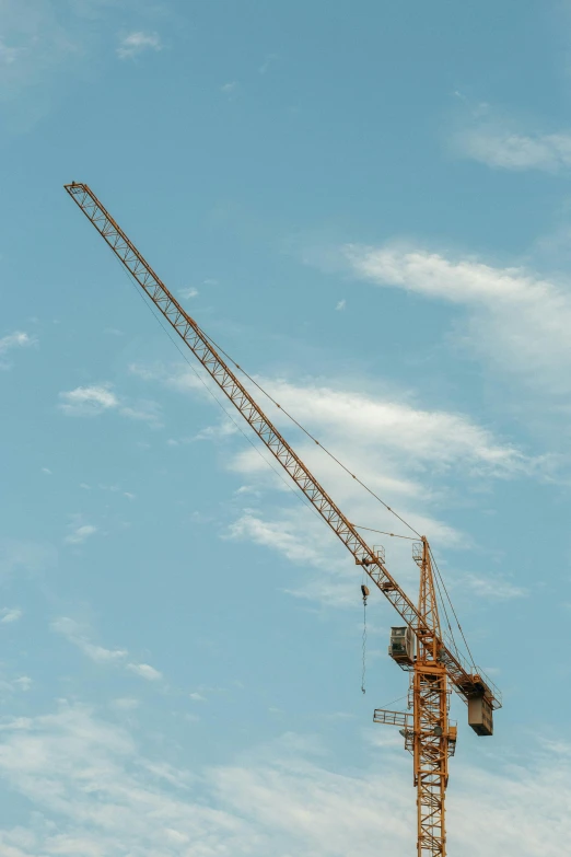 a crane that is standing out in the sky