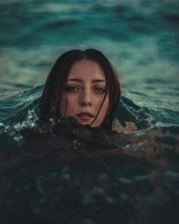 a close up of a person in water