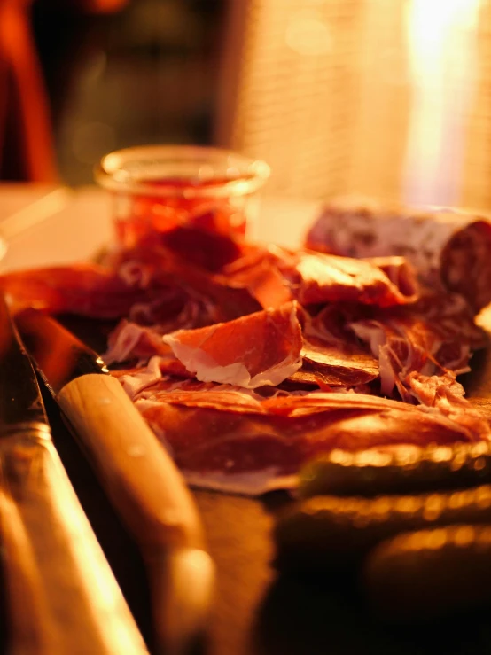 different types of meats displayed on  board