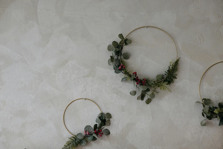 a group of wine glass ornaments with small berries