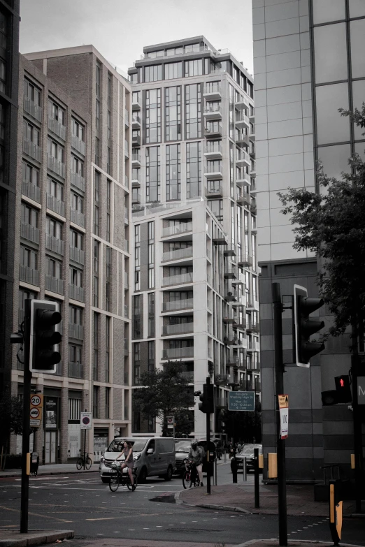 there are buildings next to the street corner