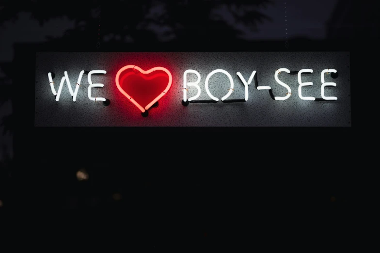 a we love boy see sign with a heart in the shape of a red heart