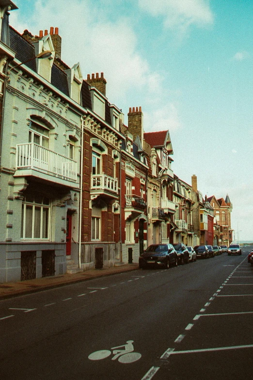 some very old buildings along the side of the street