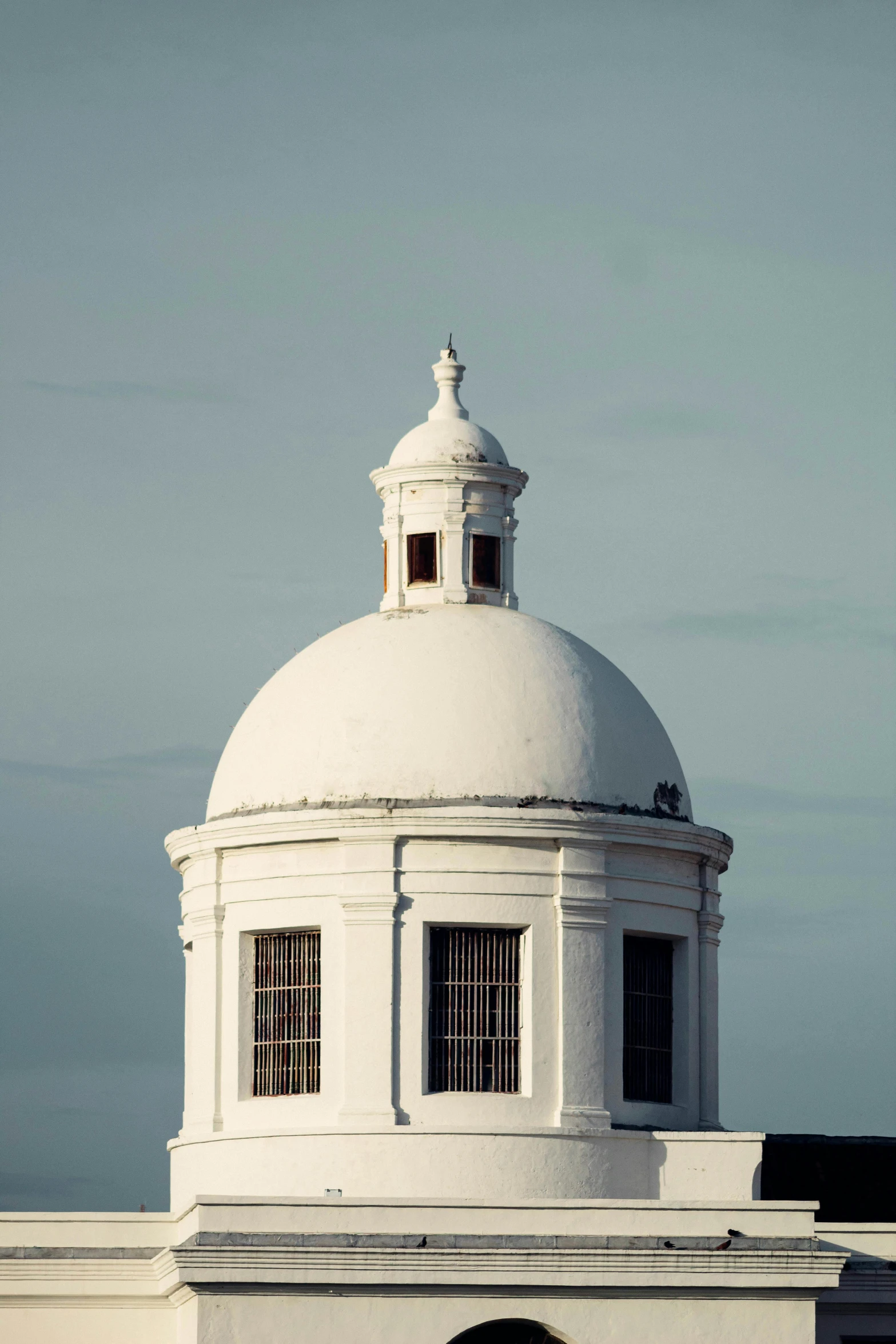 the top of a large white dome building