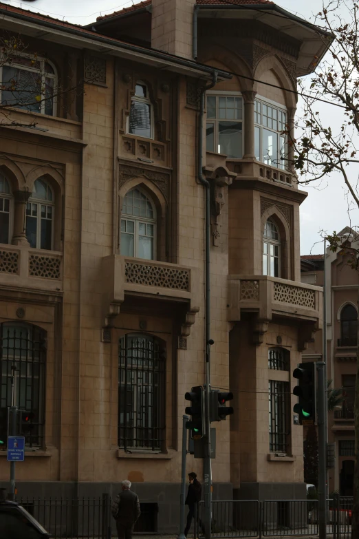 an older european building with many windows and balconies