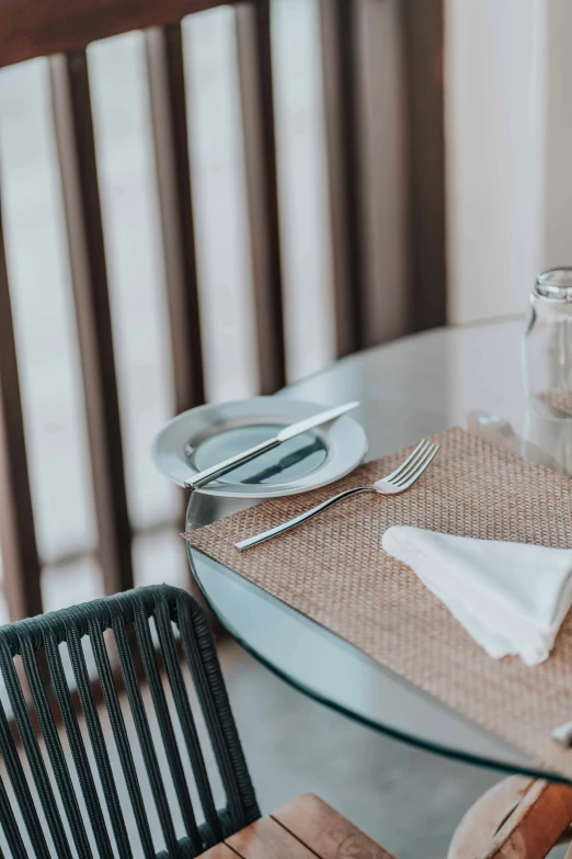 table with place setting for dining and utensils