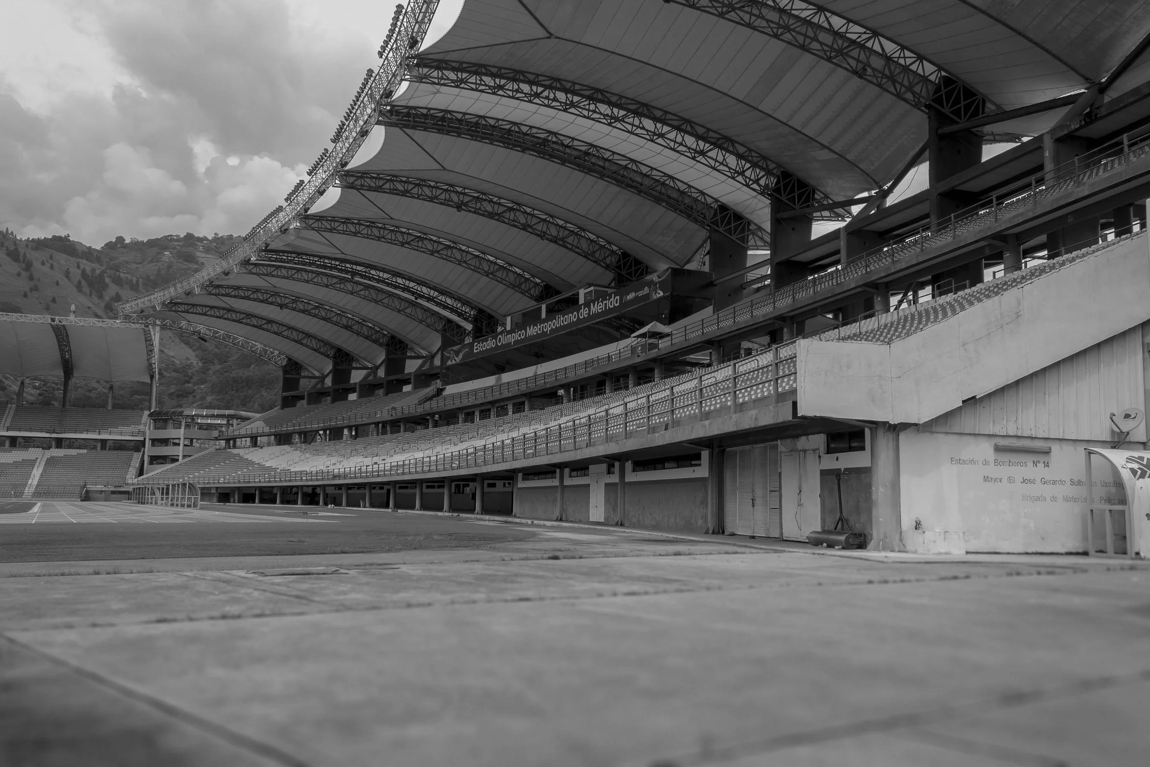 black and white image of an empty stadium