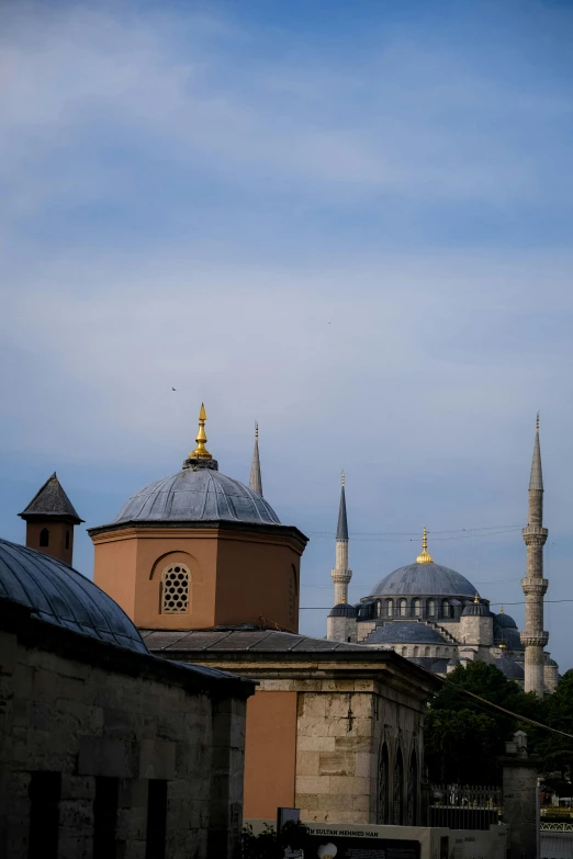 a building with a tower and two spires on top of it