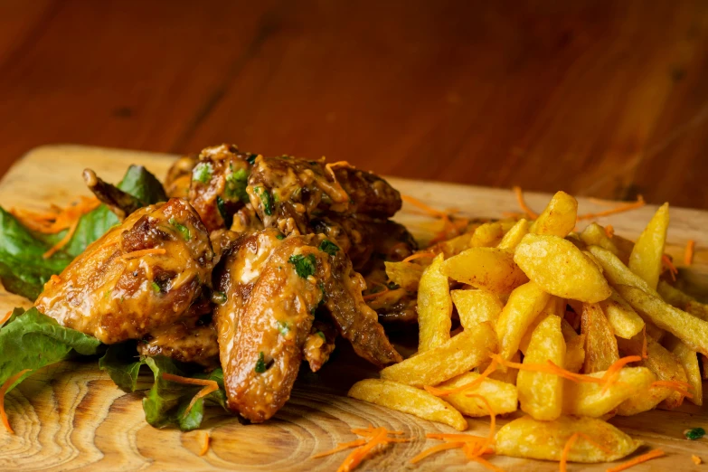 a wooden  board topped with lots of food