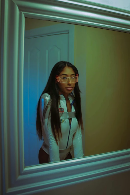 a person standing in front of a mirror with long hair