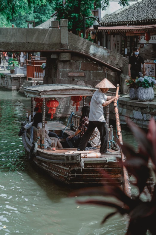 a person is in the water by a boat