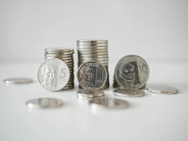 a pile of coins sitting next to each other