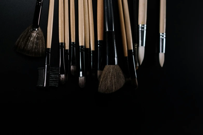 various brushes that are sitting on top of each other