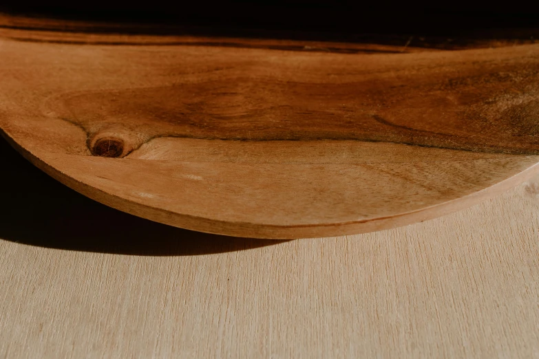 closeup of a wood  board that has holes