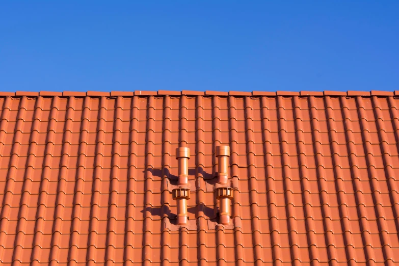 two lights on the roof of a house