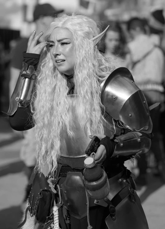 woman dressed as a warrior in black and white