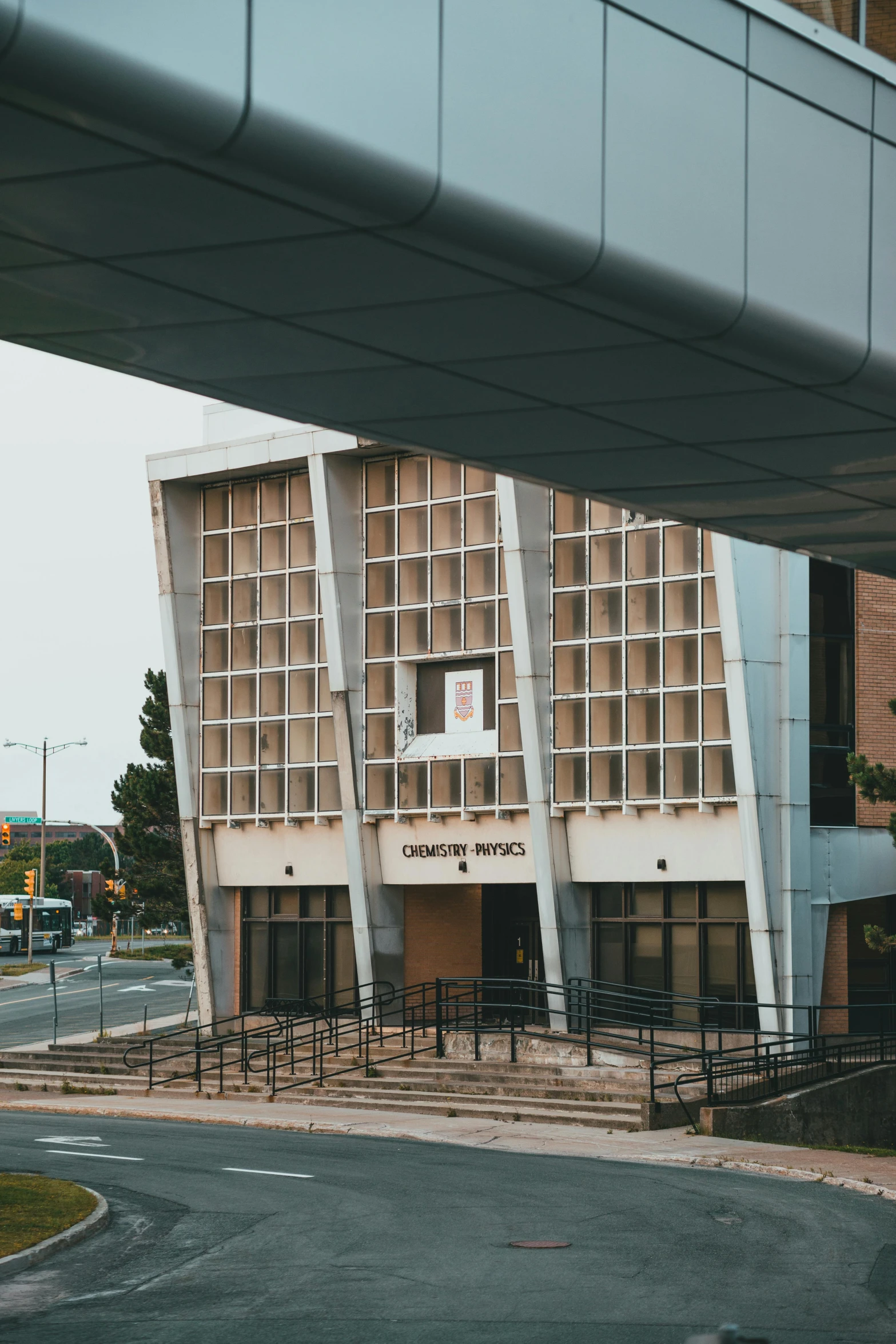 this is a building on a corner with two tall buildings