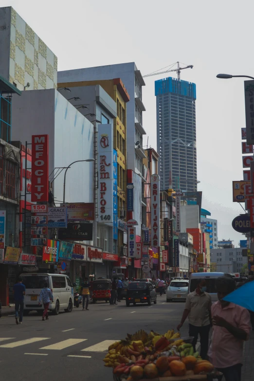 a street filled with tall buildings and traffic