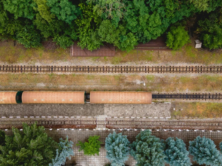 a train is going down the railroad tracks