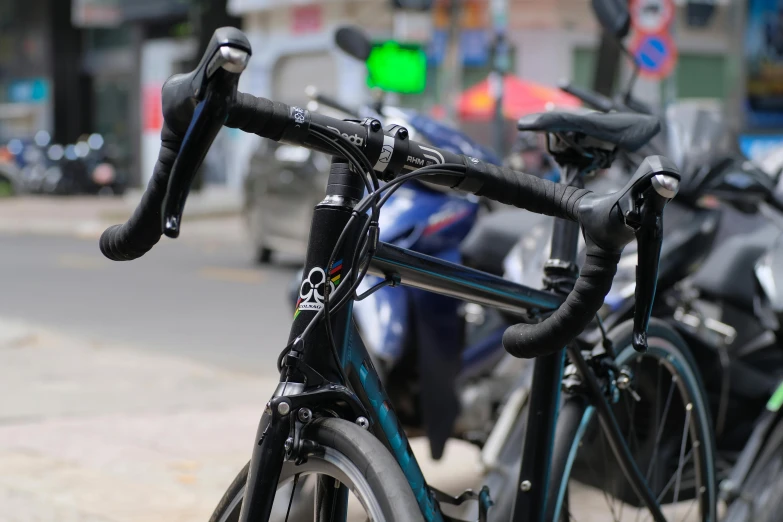 a line up of bikes are parked outside