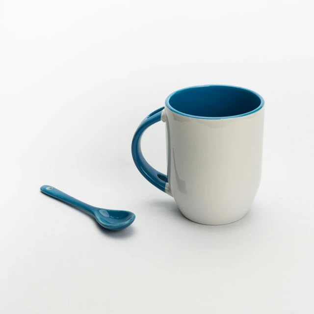 this is a cup and spoon with one stuck in the cup