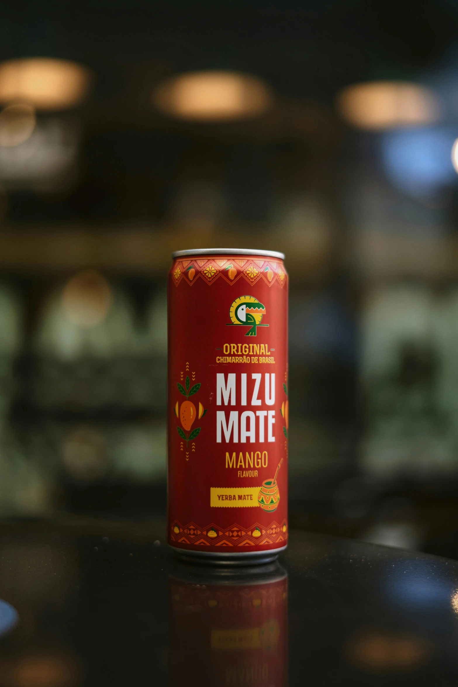 a can of mizu mate is on a table