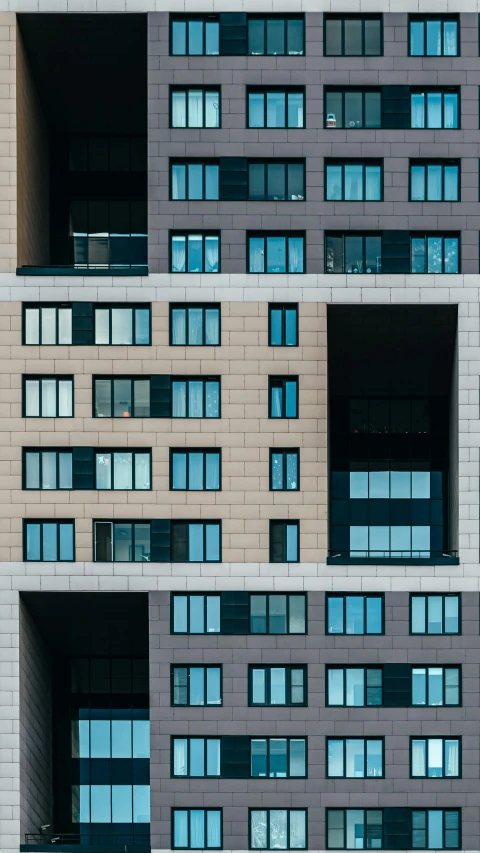 a close up of a brick building with windows