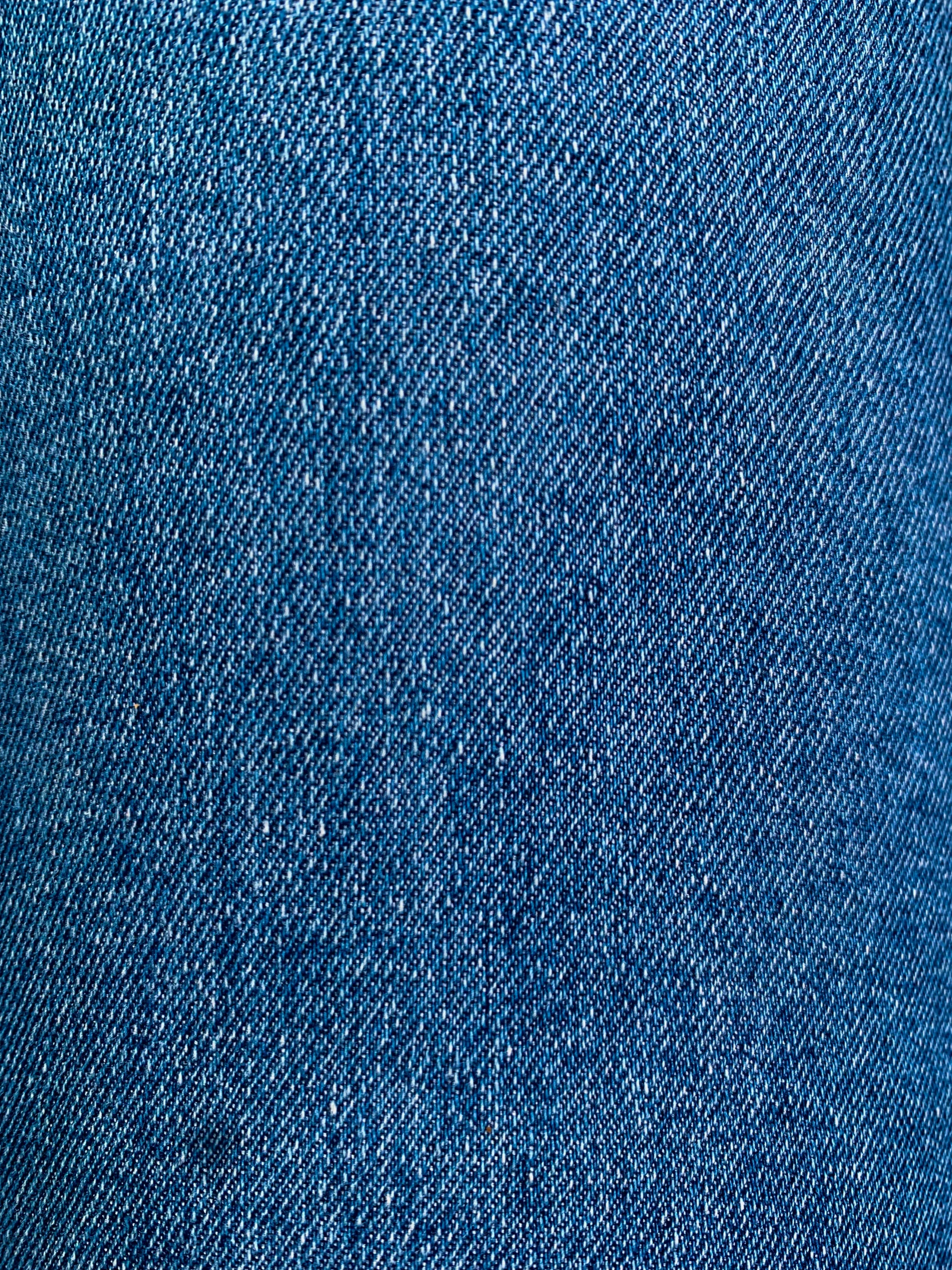 close up of blue jeans with a soft, light background