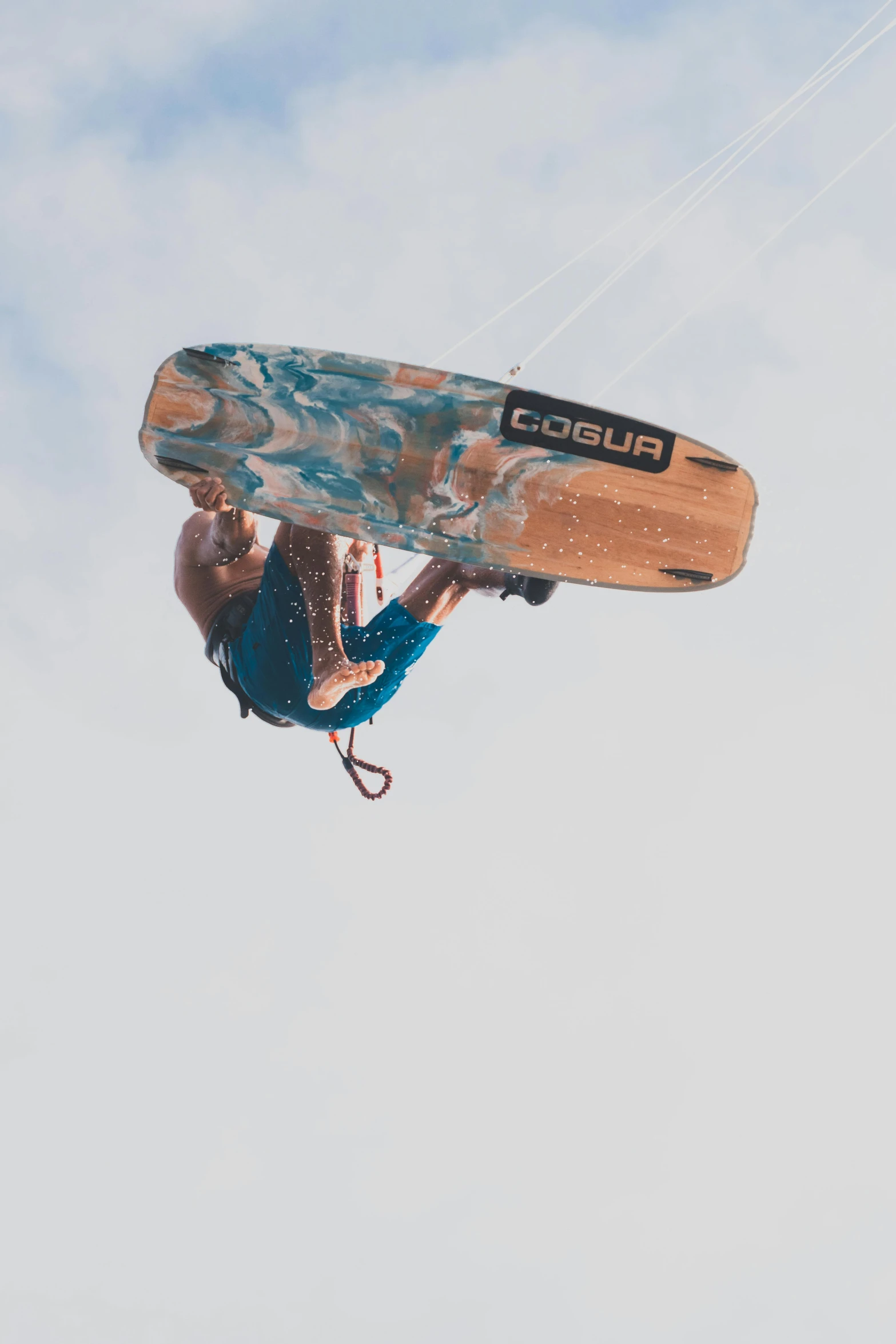 a person with a water ski holds on to a string