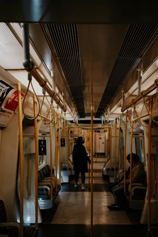 inside a vehicle looking down at an empty seat