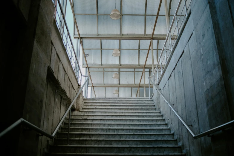 a flight of stairs that leads to another stairway