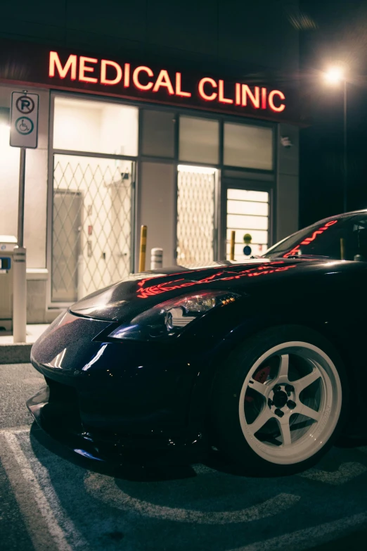 a black sports car parked on the street